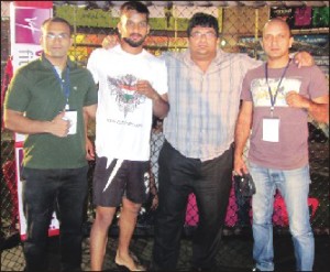 Seen in the picture (from left) Pro-MMA fighter Chaitanya Gawali, Basavesh of Mysuru, YFC President Jithendra Khare and Coach Samith Bhat.