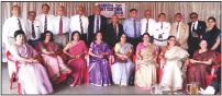 Seen in the picture are (standing from left): Lt. Col. P.C. Guru (Retd.), 19 MARATHA LI; Lt. Col. K.N. Srikantaiah (Retd.), 17 MARATHA LI; Maj. K.P. Madappa (Retd.), 22 MARATHA LI; Col. T.M. Muthappa (Retd.), 20 MARATHA LI (10 Mech Inf); Col. P.B. Chengappa (Retd.), 6 MARATHA LI; Maj. Gen. C.K. Karumbaya, SM (Retd.), 5 MARATHA LI; Capt. P.M. Ganapathy (Retd.), 17 MARATHA LI; Col. C.P. Muthanna (Retd.), 18 MARATHA LI; Lt. Col. M.M. Aiyanna (Retd.), 17 MARATHA LI; Brig. P.T. Monappa, VSM (Retd.), 17/15 MARATHA LI; Lt. Col. Thamappa (Retd.), 20 MARATHA LI (10 Mech Inf); Col. N.A. Chinnappa (Retd.), 20 MARATHA LI (10 Mech Inf) and Chaitra, wife of Maj. N. Naveen, 22 MARATHA LI. Sitting from left: Arathi Muthanna, Varija Chinnappa, Mrs. P.B. Chengappa, Lalitha Ganapathy, Sudha Srikantaiah, Lilly Ganesh, Dechu Karumbaya and Taj Madappa. 