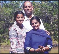 Ankitha with her parents. 