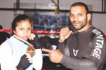 Deia S Urs proudly displaying the Gold Medal along with her MMA Coach Kru. Chethan M. Ashwathama at Kimura Fight Club. 