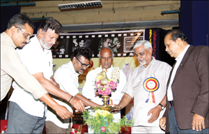 Film columnist M.N.Swamy (second from left) is seen inaugurating the Maharaja Film Club at Maharaja’s College Centenary Hall here this morning as wildlife photographer Lokesh Mosale Maharaja’s College Principal Dr. B. Nagarajamurthy, Maharaja's College Administrator Dr. Vasantha and others look on. 