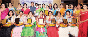 DC C. Shikha (seated centre) was felicitated by Women In Small Enterprise (WISE), the Women's Wing of Mysore Chamber of Commerce and Industry (MCCI) as part of International Women’s Day celebrations at the Quorum Hotel on Vinoba Road this morning. Also seen are ten women entrepreneurs who were felicitated by WISE and MCCI members. 