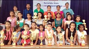 The winners of Karnataka State Women's Chess Championship 2016, conducted by Mandya Chess Academy at Gandhi Bhavan in Mandya yesterday seen with the prizes and the guests. 