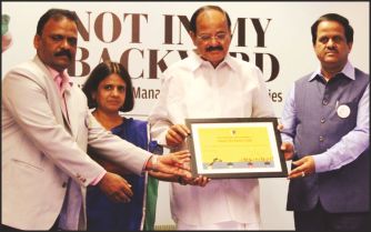 MCC Commissioner Dr. C.G. Betsurmath is seen receiving the award from Union Minister for Urban Development Venkaiah Naidu in New Delhi. 