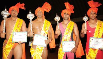 Picture shows (from left) Pahilwan Panduranga Shinde, who won 'Dasara Kanteerava' title seen with Pahilwan Koli of MEG, Bengaluru and winners of Dasara Kumara and Dasara Kishora titles.