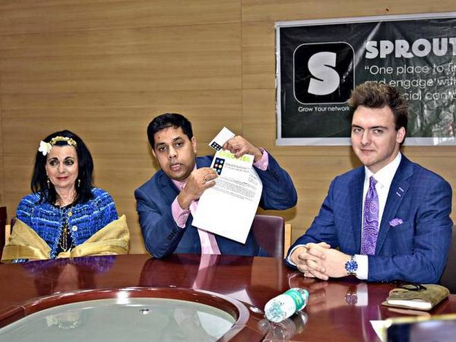 Manoj Patil, director of operations of Sprouter, and Daniel Everist, developer of the app, at a press meet in Hubballi on Friday. 
