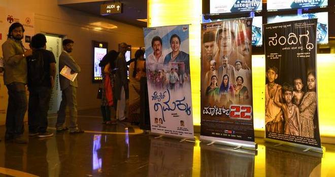 Posters of Kannada films at the 10th Bengaluru International Film Festival at Orion Mall in Bengaluru on Monday.   | Photo Credit: Sudhakara Jain
