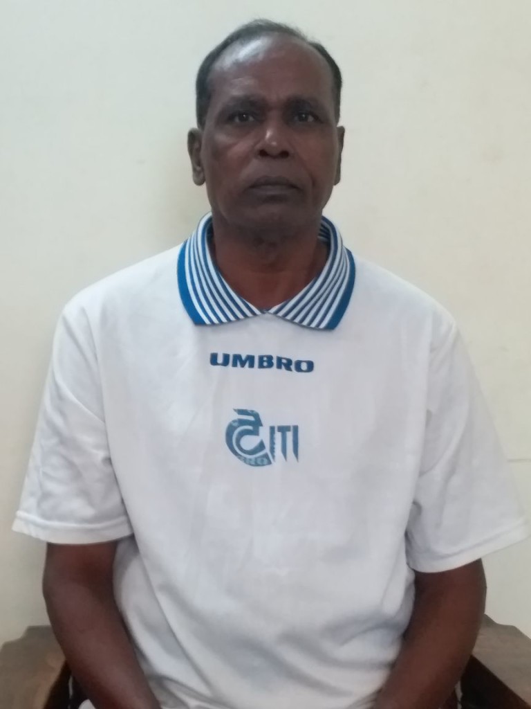 Mohan Kumar (68), a footballer who played for India internationally and is now working as a security guard at Mount Carmel College (PU), seen here wearing the kit of his former team, ITI. 