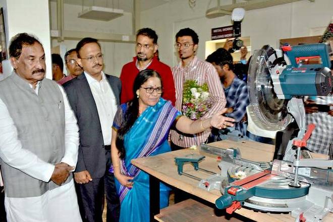 IT/BT and Heavy Industries Minister K.J. George being shown equipment in the laboratory at K-Tech Innovation Hub in Belagavi on Tuesday. 