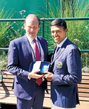 Sagar S. Kashyap with Wimbledon official Adrian Wilson. | Photo Credit: Special Arrangement